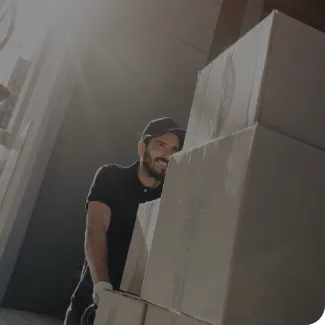 Mover putting a box in a truck