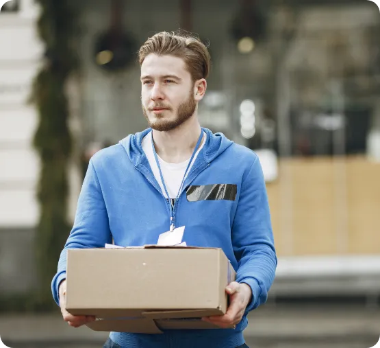 man carrying box