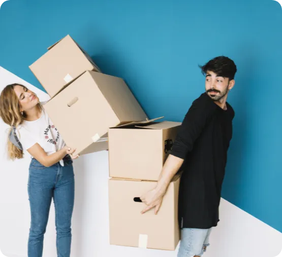 couple carrying boxes
